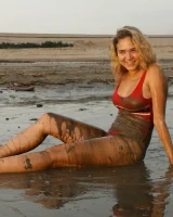 Hottie in a sexy swimsuit Sofia Orlova getting dirty on the beach