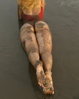 Hottie in a sexy swimsuit Sofia Orlova getting dirty on the beach