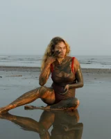 Hottie in a sexy swimsuit Sofia Orlova getting dirty on the beach