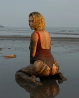 Hottie in a sexy swimsuit Sofia Orlova getting dirty on the beach