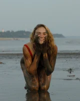 Hottie in a sexy swimsuit Sofia Orlova getting dirty on the beach