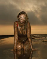 Hottie in a sexy swimsuit Sofia Orlova getting dirty on the beach