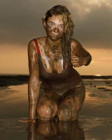 Hottie in a sexy swimsuit Sofia Orlova getting dirty on the beach