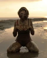 Hottie in a sexy swimsuit Sofia Orlova getting dirty on the beach