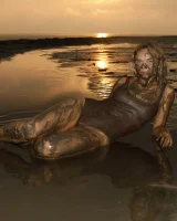 Hottie in a sexy swimsuit Sofia Orlova getting dirty on the beach