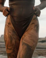 Hottie in a sexy swimsuit Sofia Orlova getting dirty on the beach