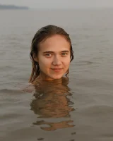 Hottie in a sexy swimsuit Sofia Orlova getting dirty on the beach