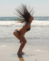 American damsel Tiffany Drake teasing in sexy bikinis on the beach