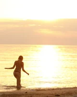 Tasty ass Ulyana Orsk is walking in the garden in tiny pink shorts and in bikini on the beach flashing sexy puffy nipples