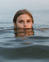 Tasty ass Ulyana Orsk is walking in the garden in tiny pink shorts and in bikini on the beach flashing sexy puffy nipples