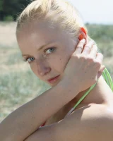 Hairy pussy baby takes off sexy bikini on the beach