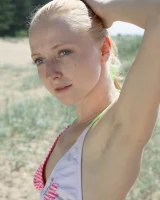 Hairy pussy baby takes off sexy bikini on the beach