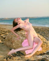 Pink micro bikini nude beach brunette with stretching nipples