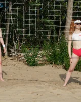 Young nude beach volleyball team