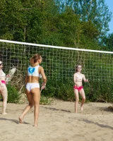 Young nude beach volleyball team