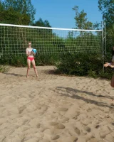 Young nude beach volleyball team