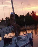 In sexy bikini, topless and nude in the evening on the yaht
