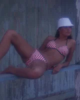 In sexy bikini, topless and nude in the evening on the yaht