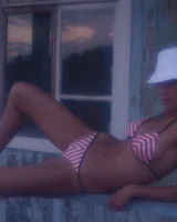 In sexy bikini, topless and nude in the evening on the yaht