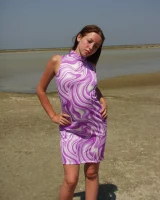 Hairy pussy baby in bikini is nude on the beach