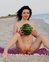 Pretty brunette teen is on the beach in grey bikini with watermelon, she strips her remarkable perfect puffy nipples body