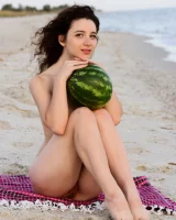 Pretty brunette teen is on the beach in grey bikini with watermelon, she strips her remarkable perfect puffy nipples body