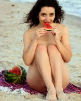 Pretty brunette teen is on the beach in grey bikini with watermelon, she strips her remarkable perfect puffy nipples body
