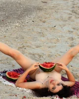 Pretty brunette teen is on the beach in grey bikini with watermelon, she strips her remarkable perfect puffy nipples body
