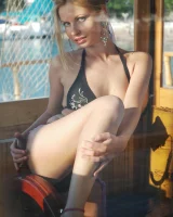 Sexy puffy nipples lady in black bikini is nude on the big boat