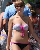 Amazing girls in sexy bikinis are walking at the streets