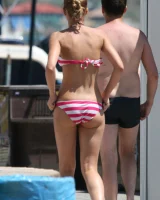 Amazing girls in sexy bikinis are walking at the streets