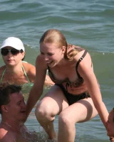 Amazing girls in sexy bikinis are walking at the streets