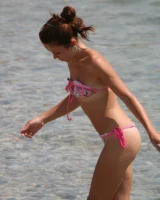 Amazing girls in sexy bikinis are walking at the streets