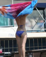 Amazing girls in sexy bikinis are walking at the streets