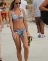 Beautiful hot young goddesses walking in bikini