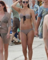 Beautiful hot young goddesses walking in bikini