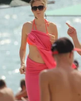 Beautiful hot young goddesses walking in bikini