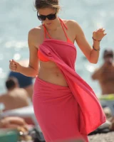 Beautiful hot young goddesses walking in bikini