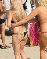 Beautiful hot young goddesses walking in bikini