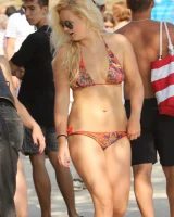 Beautiful hot young goddesses walking in bikini