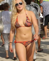 Beautiful hot young goddesses walking in bikini