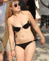 Beautiful hot young goddesses walking in bikini