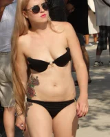 Beautiful hot young goddesses walking in bikini