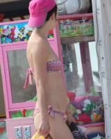 Beautiful hot young goddesses walking in bikini