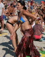 Beach dancing candid girls in sexy bikinis