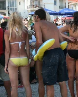 Beach dancing candid girls in sexy bikinis