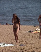 Candid girls in bikini on the beach