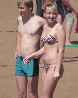 Hot candid babes in bikinis playing beach volleyball