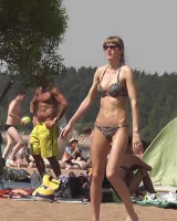 Hot candid babes in bikinis playing beach volleyball