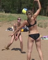 Hot candid babes in bikinis playing beach volleyball